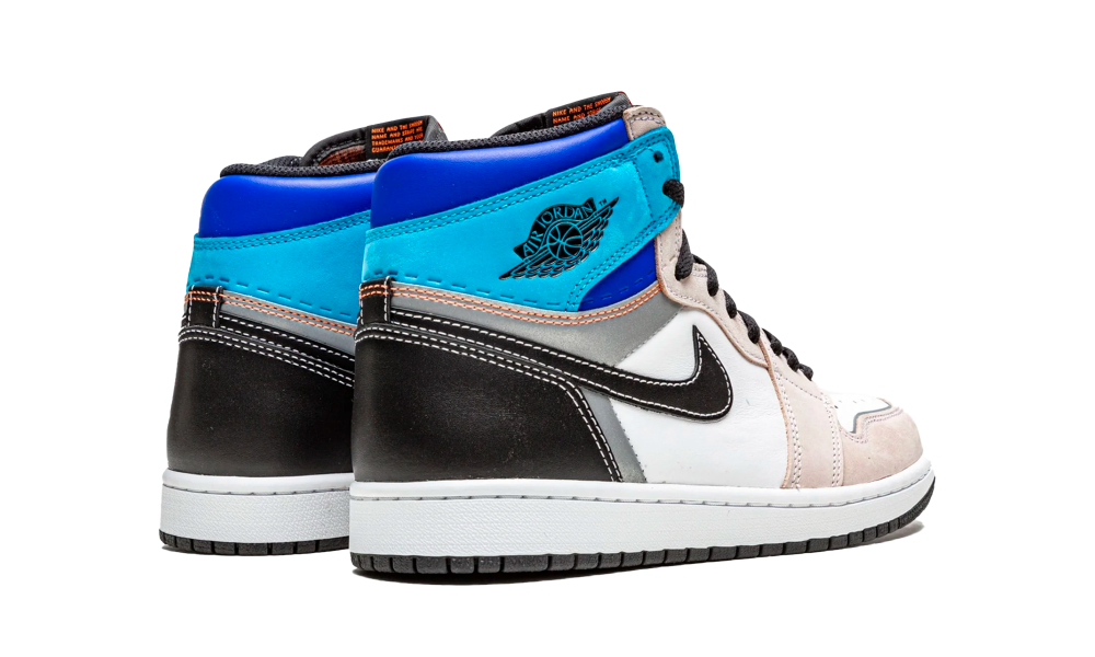 Side view of a pair of Nike Air Jordan 1 High OG Prototype sneakers featuring blue, black, white, and beige accents, representing exclusive sneakers available in Europe. The real deal.