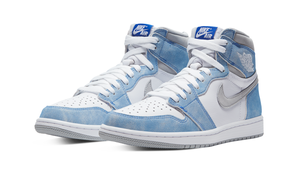 Pair of Nike Air Jordan 1 High Hyper Royal sneakers in white and light blue tones, showcasing high-top design and exclusive European style, the real deal.