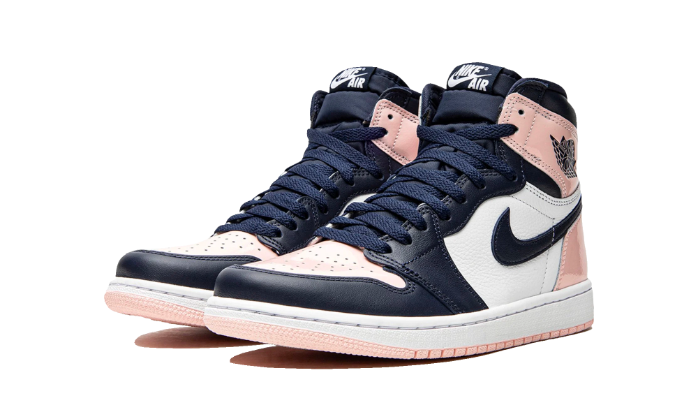 Nike Air Jordan 1 High OG Atmosphere sneakers in navy blue, soft pink, and white leather, showcasing iconic high-top design with a Nike Air logo and exclusive European release.