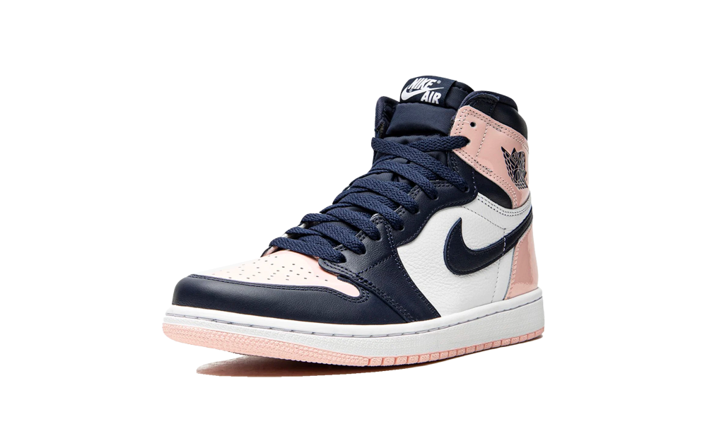 Nike Air Jordan 1 High OG Atmosphere sneaker in navy blue, light pink, and white leather, showcasing a high-top design with classic Air Jordan wings logo, the real deal exclusive in Europe.