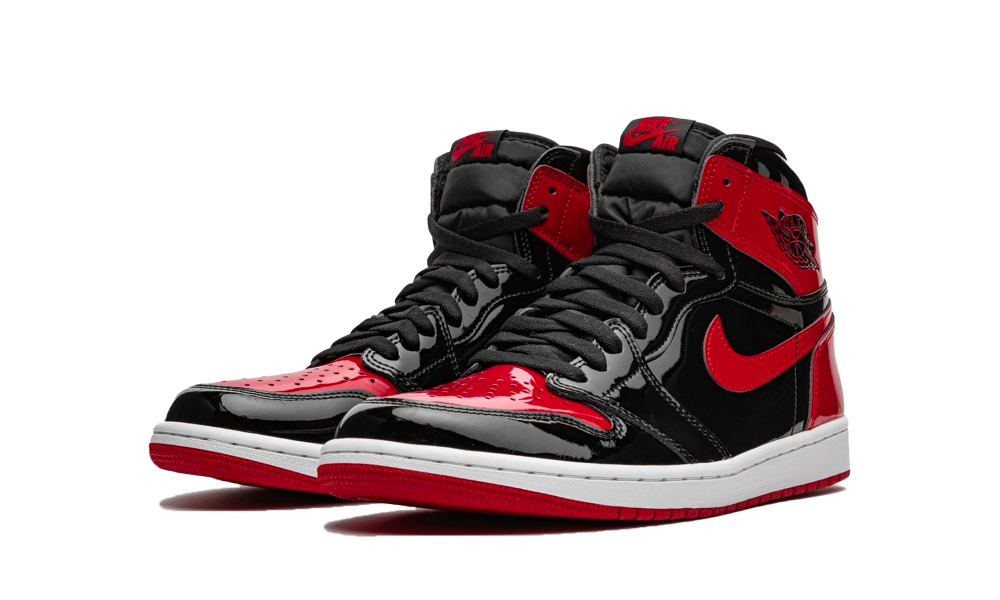 Nike Air Jordan 1 High OG Bred Patent sneakers in glossy black and red patent leather with white midsoles, showcasing exclusive high-top design and premium craftsmanship.