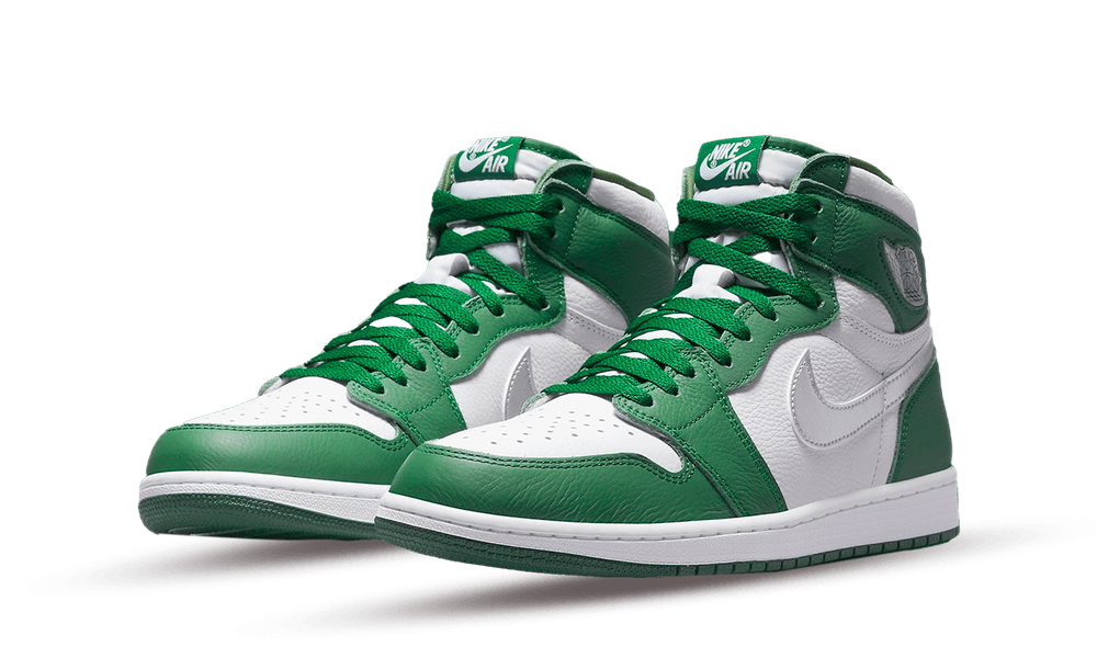 Pair of Nike Air Jordan 1 High OG Gorge Green sneakers featuring white leather with green overlays and matching green laces, showcasing classic high-top design and premium craftsmanship.