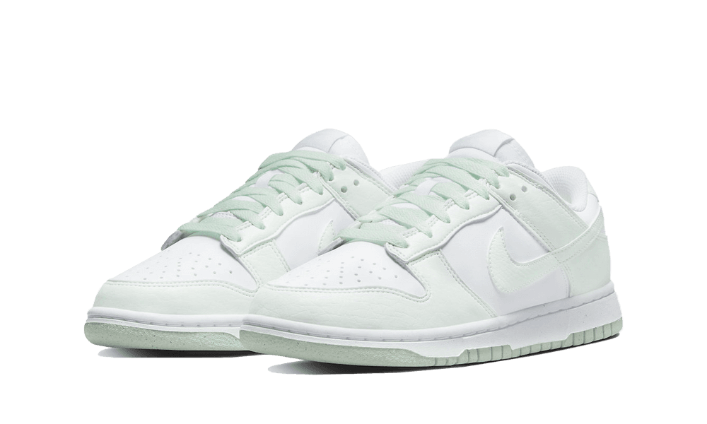 Pair of Nike Dunk Low Next Nature White Mint sneakers featuring a clean white and soft mint colorway, designed for exclusive sneaker enthusiasts across Europe. The real deal.